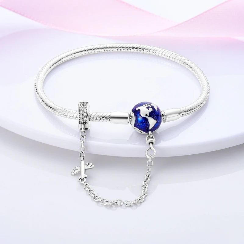 Bracelet Globe & Avion – Voyageuse & Aventurière